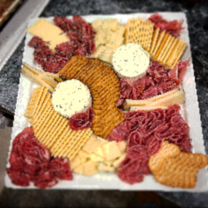 platter with meat, cheese, and crackers