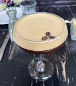 Espresso martini with three coffee beans